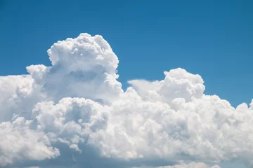 Poster Witte wolken en blauwe lucht © daizuoxin