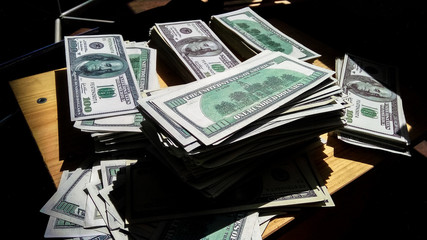 Stack of 100 dollar bills close up