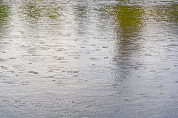 The surface of the lake during the rain.