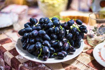 Black grape on a plate