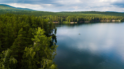 Fototapeta na wymiar Beautiful pine forest lake landscape