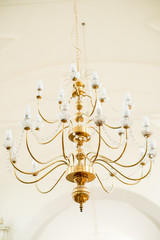 Wedding in the church. bright temple. glass chandelier.