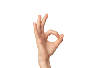 Woman hand ok sign on a white isolated background with clipping path