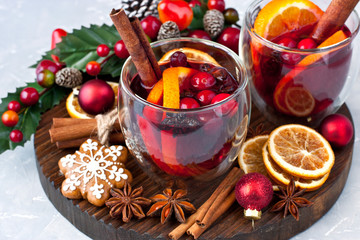 Mulled wine with slice of orange and spices