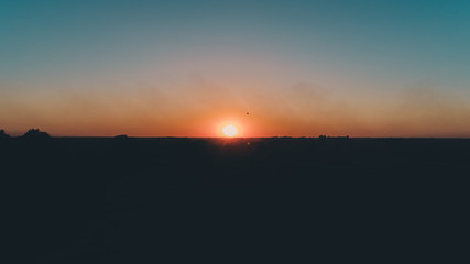 Aerial view of the sunset. A balloon against the sunset. Sky. Ukraine.