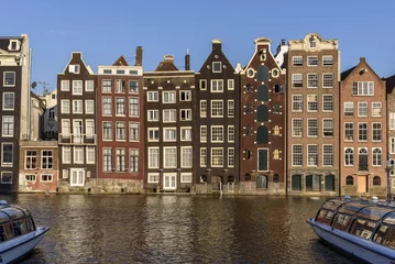 Keuken spatwand met foto Tall Dutch houses, overlooking a canal in Amsterdam. These houses are often called the Gingerbread Houses © parkerspics