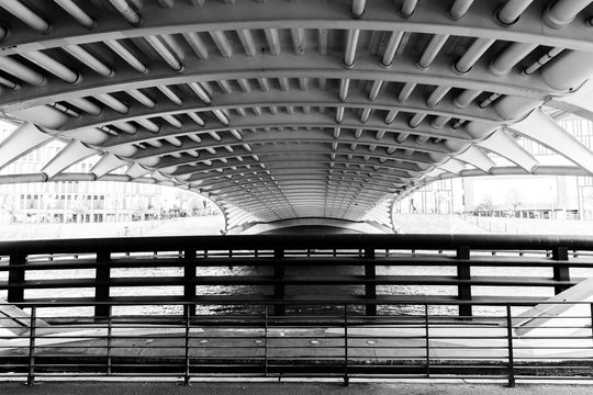 Fototapeta crown prince bridge (german Kronprinzenbruecke) from below in black and white, the road bridge crosses the river spree in berlin and connects the government quarter with the Tiergarten district.