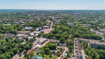 Fototapeta na wymiar Aerial view of the square. Roofs of buildings. Park. Trees. Road. Panorama. Ukraine.