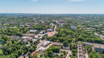 Aerial view of the square. Roofs of buildings. Park. Trees. Road. Panorama. Ukraine.