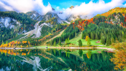 Beautiful view of idyllic colorful autumn scenery in Gosausee lake Austria - obrazy, fototapety, plakaty
