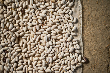 Common Beans  over rustic background. Top view