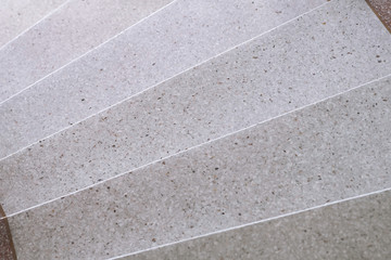 Fototapeta premium Stairs Terrazzo polished stone walkway and floor, pattern and color surface marble and granite stone, material for decoration background texture, interior design. selective focus.