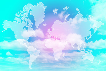Double exposure of world map above sweet pastel colored cloud and sky, soft cloudy with gradient...
