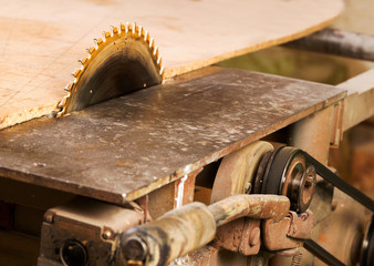 Carpenter tools on wooden table with sawdust. Circular Saw. Cutting a wooden plank