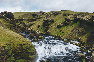 Fototapeta na wymiar high angle view of beautiful Skoga river flowing through highlands in Iceland