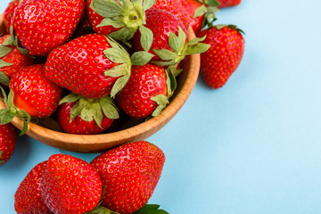 juicy fresh strawberry on a delicately blue background