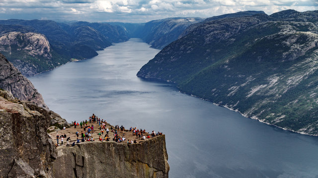 Preikestolen, pulpit rock with tourists and fjord