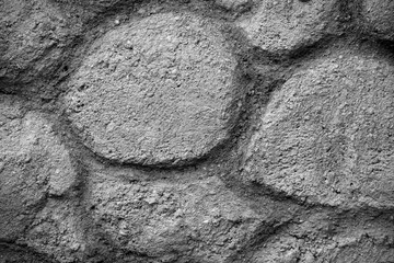 imitation of stone from cement, garden design on the wall