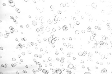 black bubbles on a white background