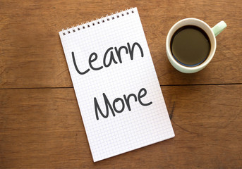 Word writing text Learn More on notebook