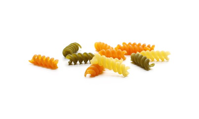 Colorful Italian spiral shaped pasta, macaroni, isolated on white background