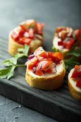 Tomato bruschetta with red onion and parsley