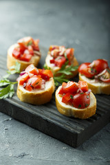 Tomato bruschetta with red onion and parsley