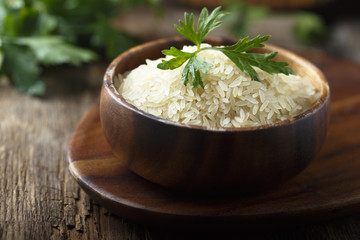 White rice in the wooden bowl