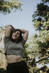 Woman stretching while on a hike