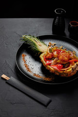 delicious japanese dish served in halved grilled pineapple