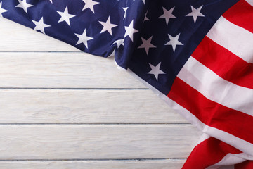 American flag close up on wood desk