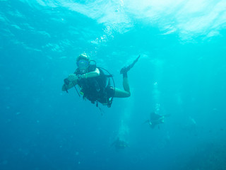 Diving girl in Utila Honduras