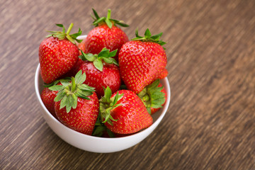 Fresh red strawberry in a bowl