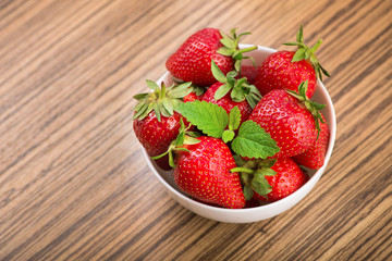 Fresh red strawberry in a bowl