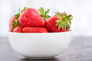 Fresh red strawberry in a bowl