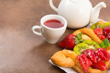 Fruit tea and sweet bakery with strawberry
