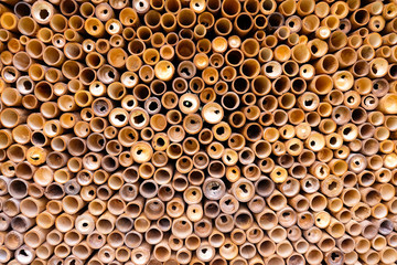 Close up of wall made of vintage bamboo fence