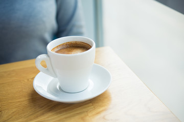 Americano coffee cup with milk