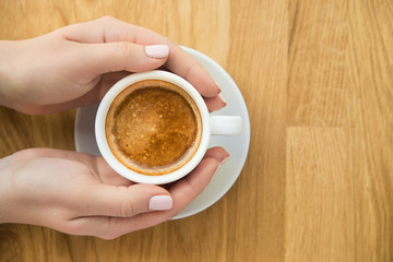 Blonde woman with white coffee