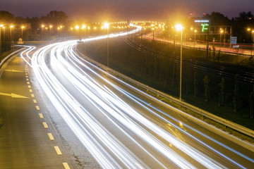  light trails on motorway highway at night, long exposure