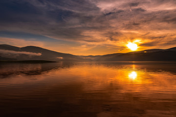 Fototapeta na wymiar Mountain Lake sunset 