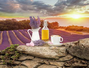 Fototapety  Lavender still life with cup of coffee against fields in Provence, France