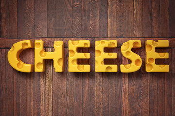 3d render illustration of the word cheese on rustic wooden background