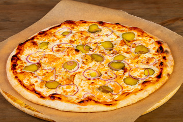 Pizza with pickled cucumbers