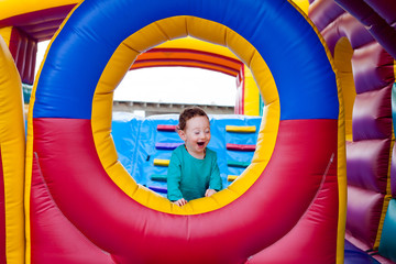 Funny toddler laugh on trampoline