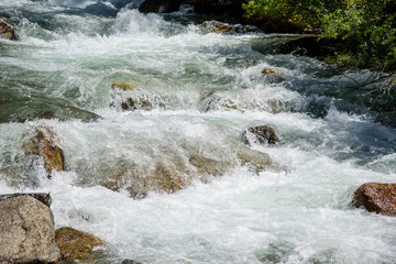 Fast mountain river in Kyrgyzstan. Sarah.