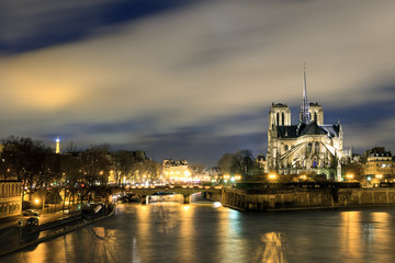 Fototapeta na wymiar Beautiful view of the river Seine with the Notre-Dame Cathedral in Paris at night