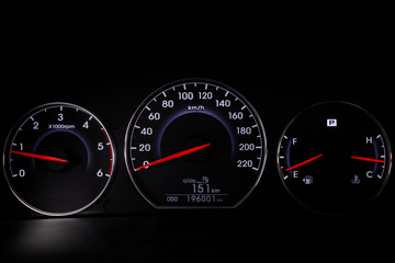 Speedometer and steering wheel. Luxury car interior details. 