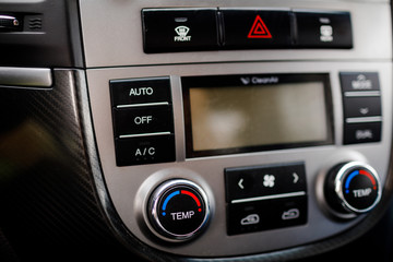 Modern luxury prestige car interior, dashboard, steering wheel.