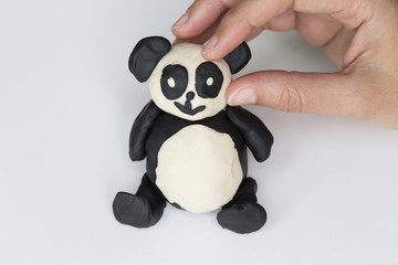 step by step making panda with play dough for children's activity. school,nursery or kindergarten lesson plasticine concept. © Fertas